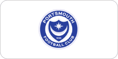 The logo for Portsmouth Football Club featuring a blue circle with the text "Portsmouth Football Club" around a shield design containing a crescent moon and star.