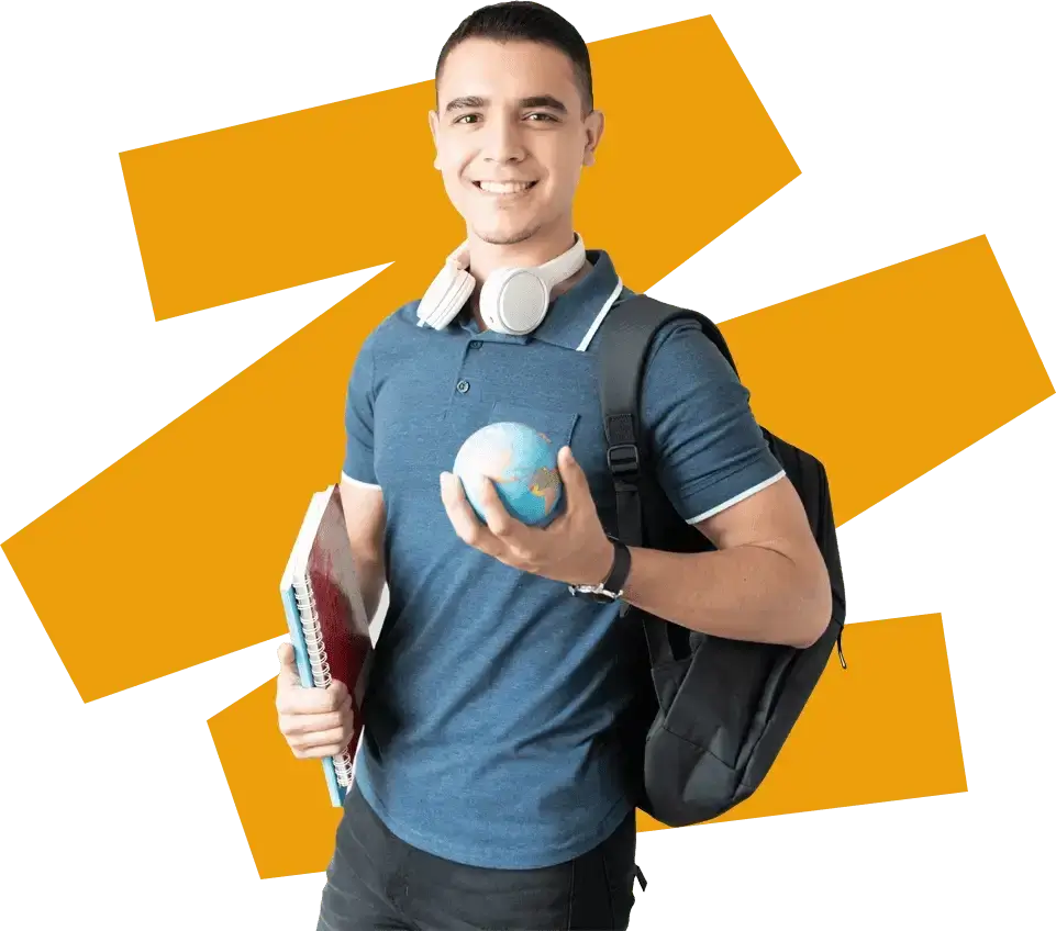 Smiling student holding globe and books.